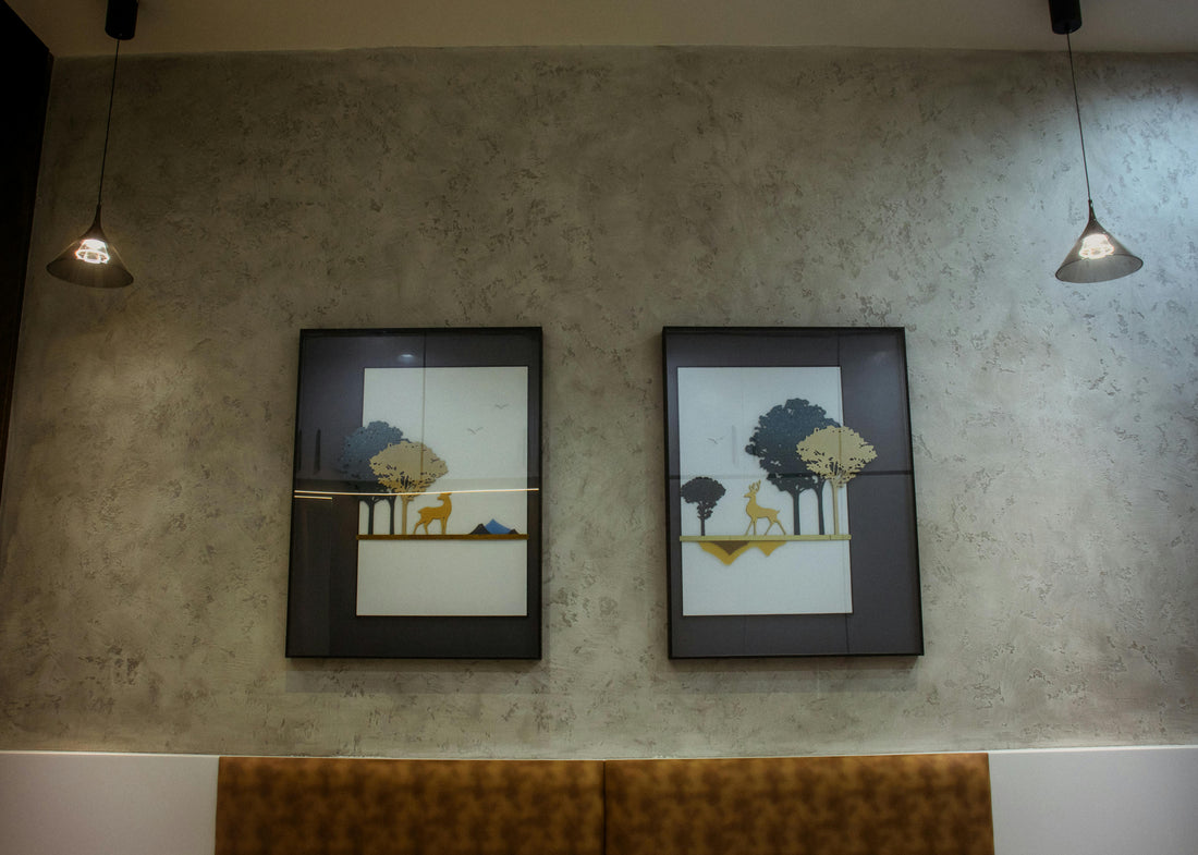 Modern living room wall decor ideas with minimalist framed wall art, textured wall finish and stylish lighting for small UK spaces