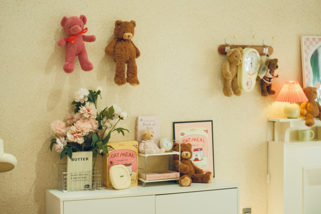 cosy winter nursery UK with soft lighting, teddy bears and baby room wall decor